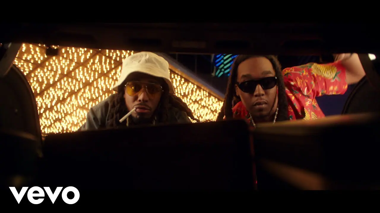 Still from the official Hotel Lobby music video, which is distinct from the orange A COLORS SHOW performance that inspired the AI-trend visual language.